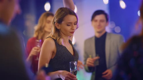 Friends Dancing and Celebrating at an Urban Night Party