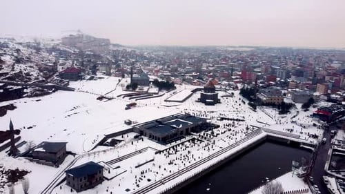 Drone Perspective of Snowy City Square and Kars River Park in Eastern Anatolia, Turkey
