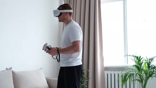 Man Wearing Virtual Reality Goggles