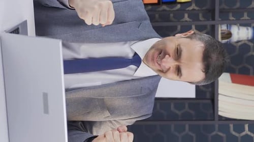Vertical Video of Successful and smart office worker man happy and excited.