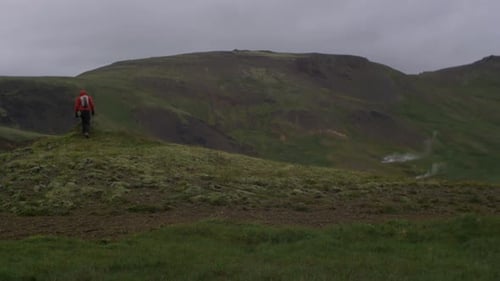 beautiful iceland landscape, one person hiker walking in the frame,
