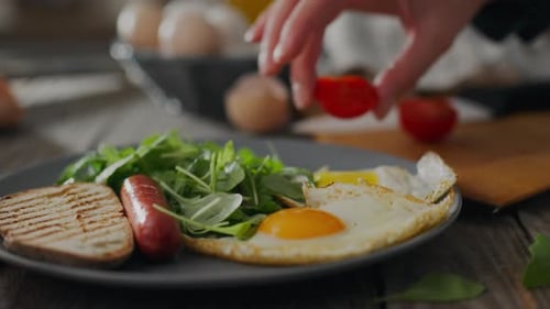 Adding Tomatoes to a Healthy Fried Egg Breakfast