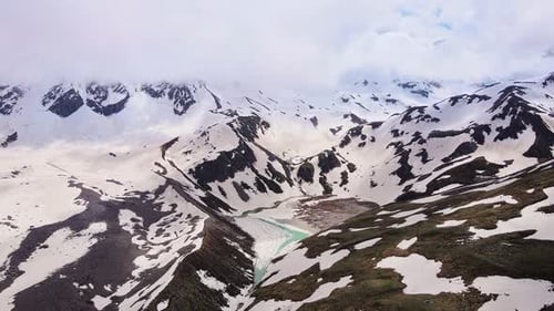 Alpine Scenery of Mountain Peaks in the Clouds