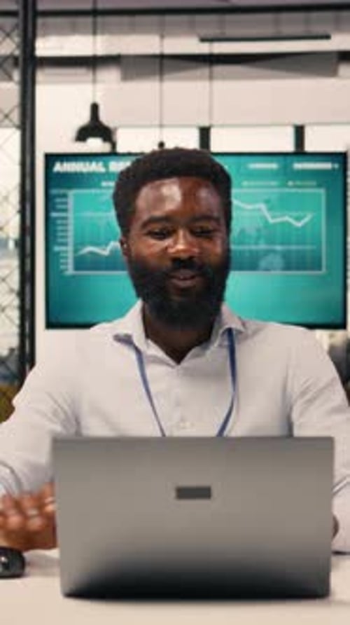 Vertical Video Black Man Professional Working on Laptop Within Multinational Company