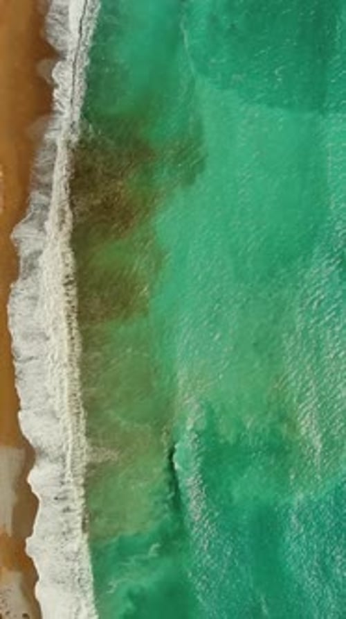 Beach and sea waves top vew