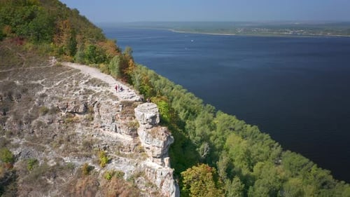 Hikers on the rock. Group of hikers stand on top of the rock ( Camel Rock) and enjoy the view. Zhigu
