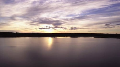 Aerial Over Beautiful Lake At Sunset