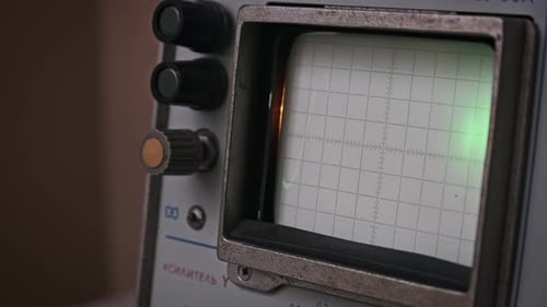 Oscilloscope Showing Fluctuating Signal on Grid