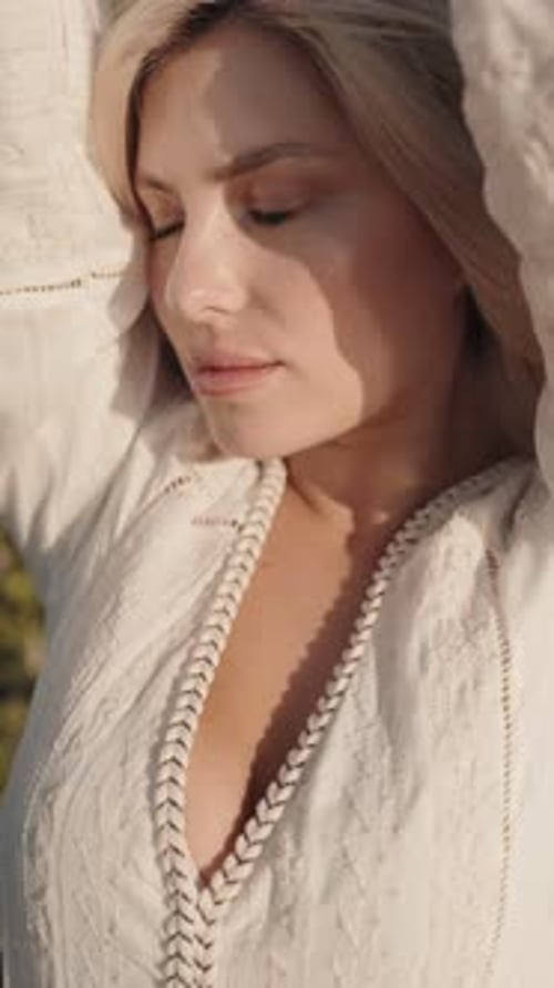 Woman Posing in White Dress in Nature