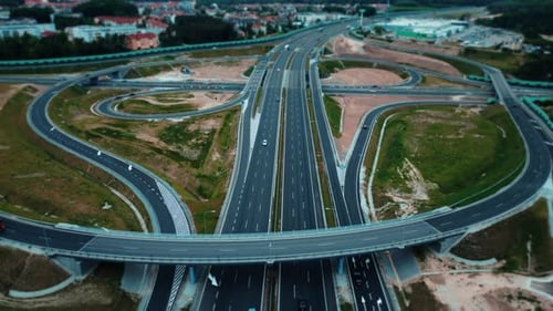 Aerial view of the road junction at the intersection of suburban highways.