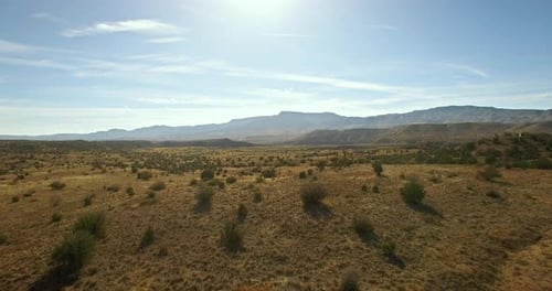 Aerial pullback over the shrinking grassland of Northern Arizona.