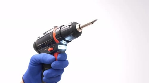 Hand Holds Cordless Drill on White Background