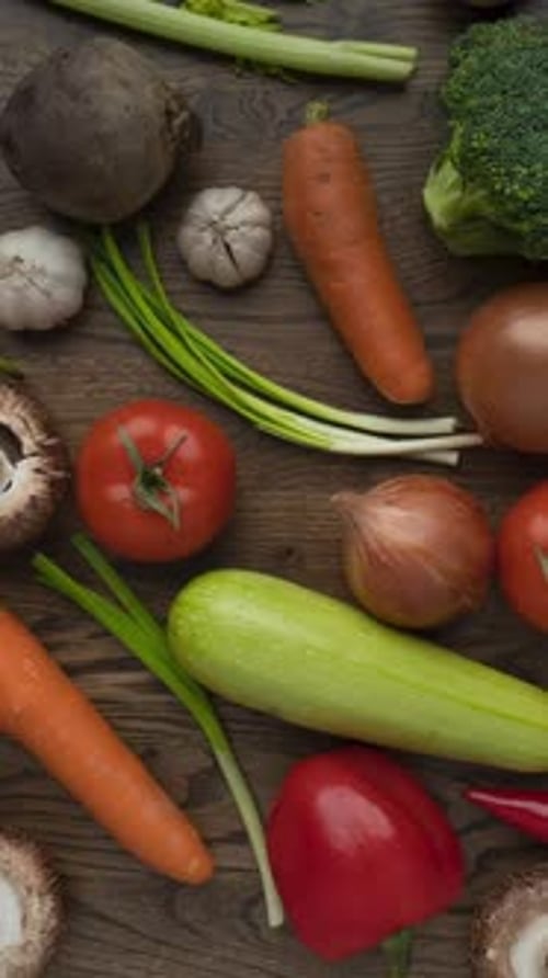 Fresh Vegetables Displayed on Wooden Table