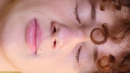 Close-up of Young Adult Opening Eyes