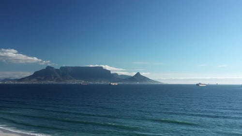 View of Table Mountain and Lion's Head Mountain Overlooking the Atlantic Ocean From Across Blouberg