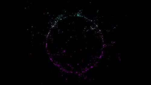 circle formed by green and pink lights particles on black background