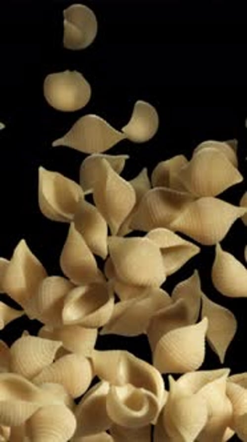 The Dry Pasta Flies Up and Falls Down Filmed on a Highspeed Camera at 1000 Fps