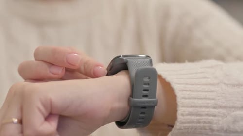 Close up of Woman Using Smart Watch
