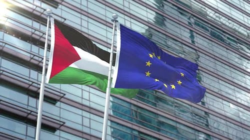 Palestine and European Union Flags Waving Against Modern Building