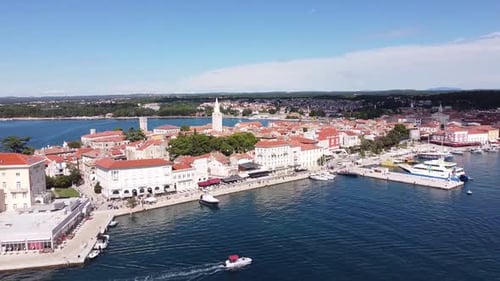 Porec at Istria, Croatia - Aerial Drone View (Fly Back) of the Peninsula with Town Center, Boulevard