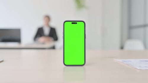 Smartphone with Chroma Key Standing on Table