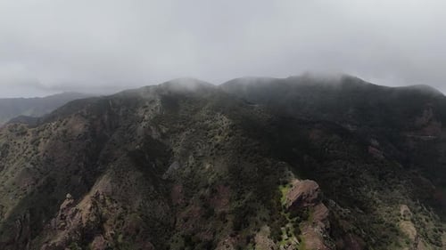 Aerial Drone View of Mountains and Cliffs in Northern Tenerife on a Cloudy Spring Day