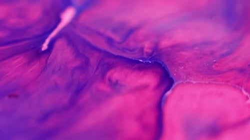 Abstract Swirling Pink and Purple Paint Background