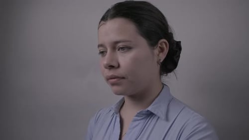 Woman Checking Time on Her Watch