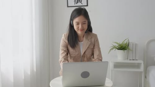 Professional Woman Working Remotely Video Conferencing