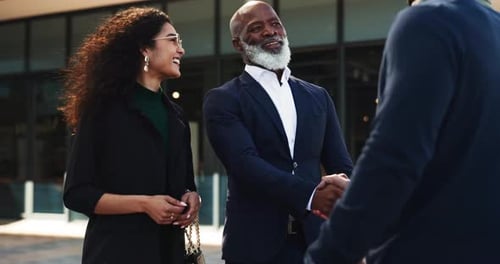 Handshake, welcome and happy business people in city by office for career, job and work opportunity