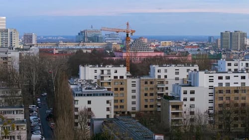 Tower crane for highrise building construction in urban residential neighbourhood, Mokotow, Warsaw