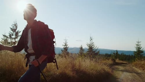 Happy Hiker Exploring Mountain Landscape