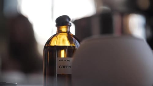 Jar of Scented Candle Perfume Stands on a Table a Close Up View