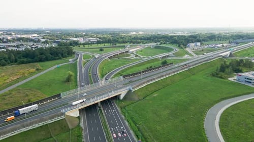 Cars Moving on Transport Road Junction in City Aerial View