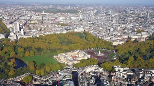 Aerial view of Buckingham Palace and its gardens, across to Victoria and St Jame's Park, London UK.