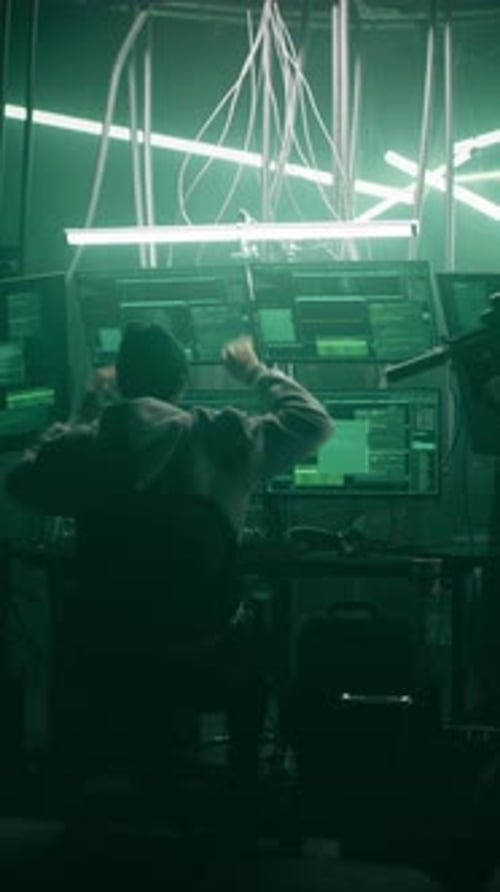 Coder Interrupted by Intruder in Dark Futuristic Room