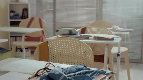 Pastel Interior of School Classroom with Personal Belongings of Pupils