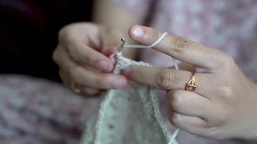 Hands Crocheting Lacy Pattern