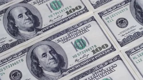 Crisp one hundred dollar bills close up