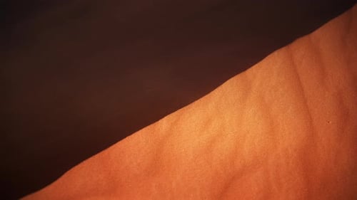 Orange Sand Dunes in Desert Landscape