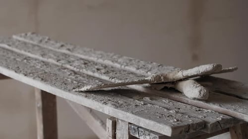 Putty Knife and Scaffolding in the Apartment