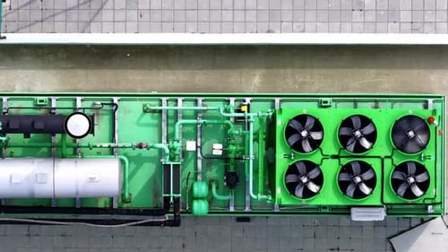 Aerial top down view of ventilation system on industrial building roof