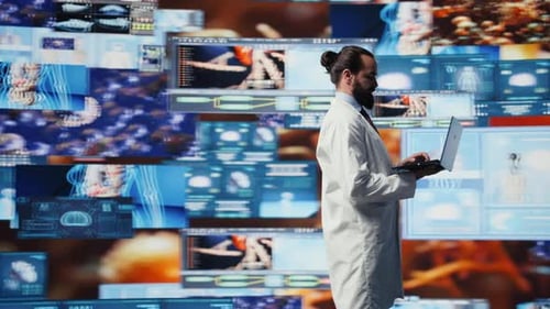 Scientist Using Laptop in Futuristic Medical Lab
