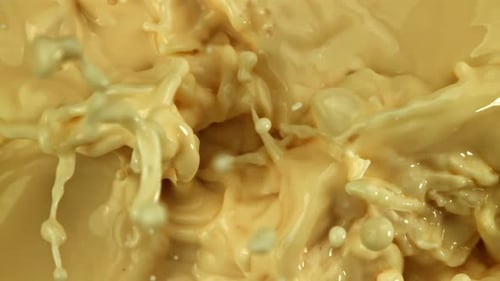Super Slow Motion White Chocolate Splashes Filmed on a Highspeed Camera at 1000 Fps
