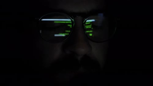 Close-up professional hacker glasses.