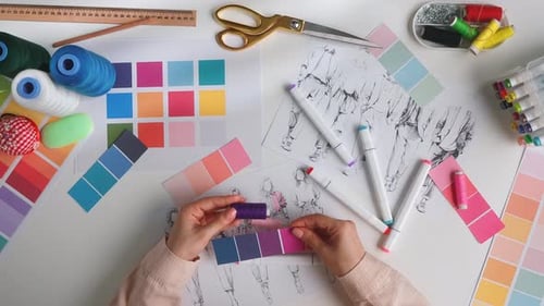 Creative Fashion Design Process with Color Samples and Sketches