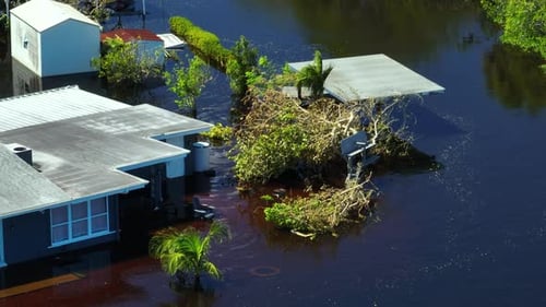 Heavy Flood with High Water Surrounding Residential House After Hurricane Ian Rainfall in Florida