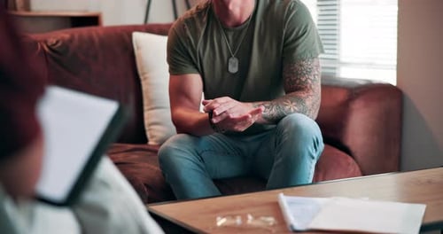 Man Talking to Therapist on Couch