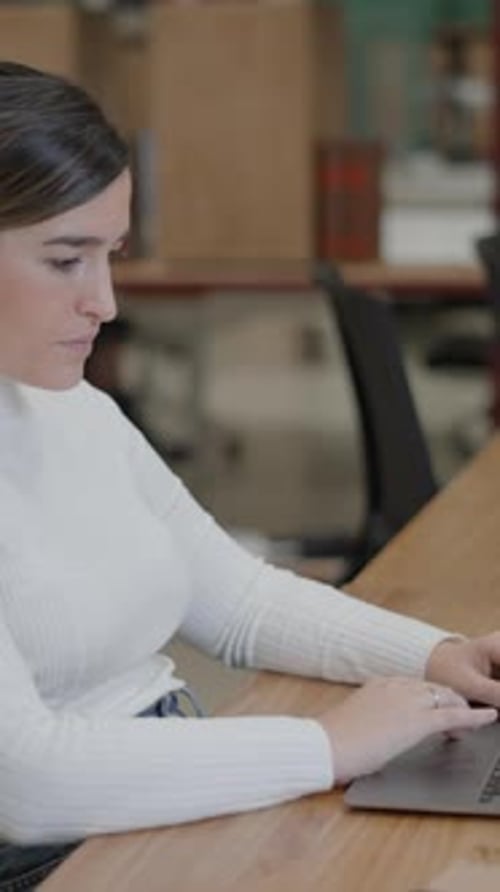 Focused Young European Businesswoman or Student Looking at Laptop Learning Serious Woman Working or