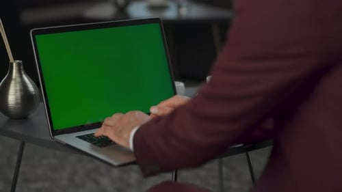 Closeup Man Arms Texting Green Screen Laptop at Cabinet. Anonymous Ceo Pressing
